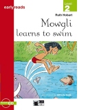 Mowgli learns to swim